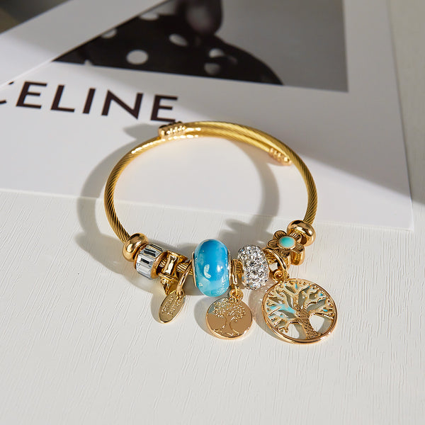 Gold Charm Bracelet for Women with Blue Beads and Tree of Life Charms - Elegant and Stylish Jewelry for Any Occasion-Women's Bangle-SunnyHouse Jewelry